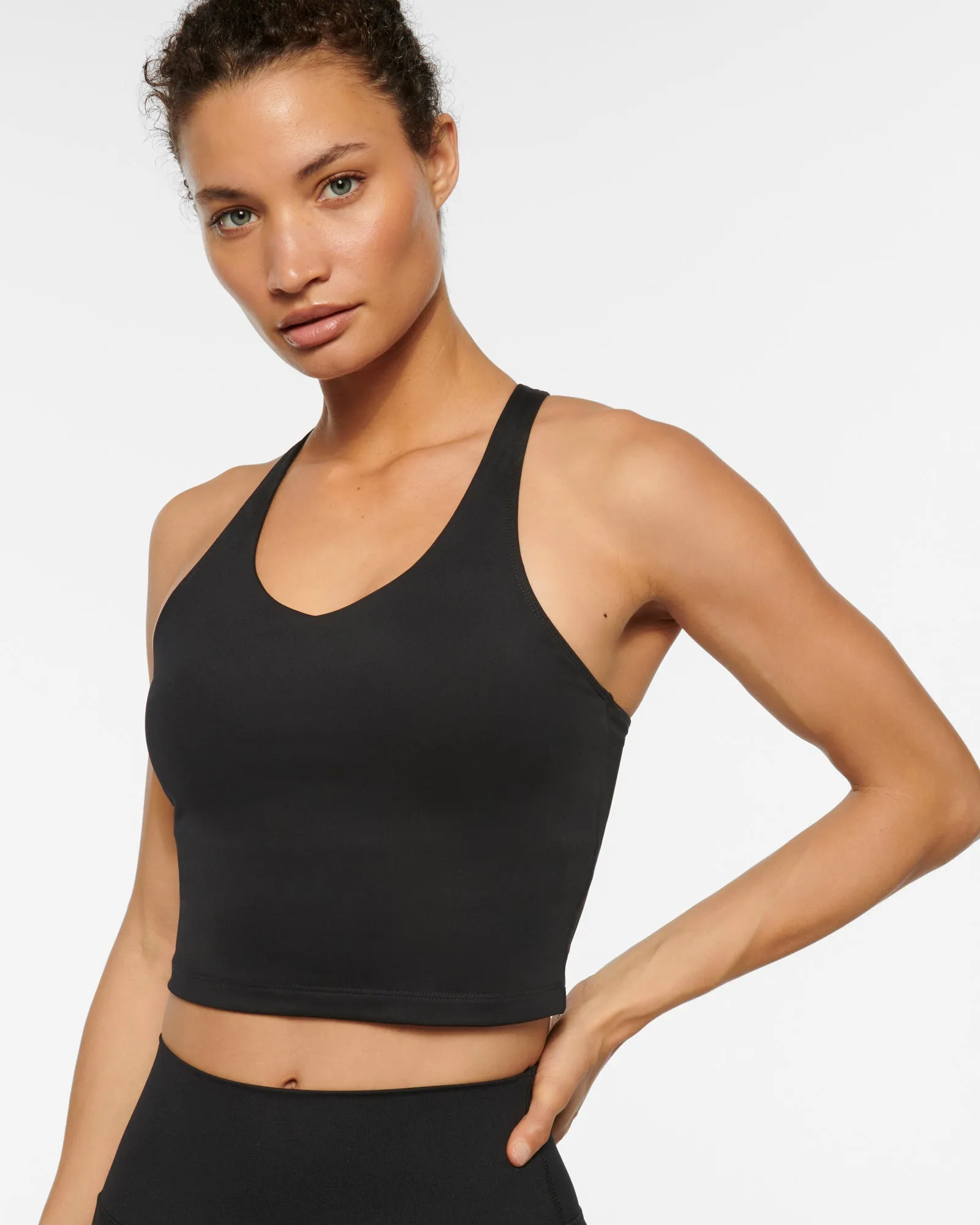 ESSENTIAL LONGLINE CROP TANK BLACK